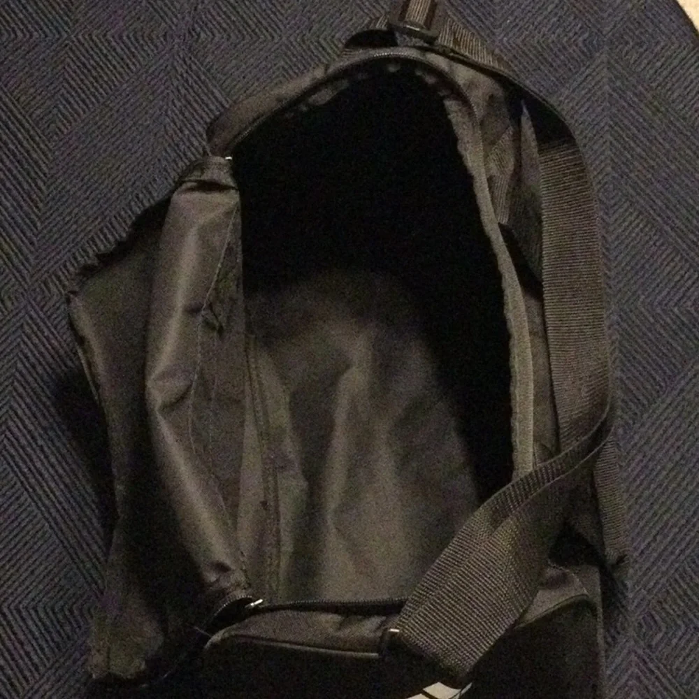 Adidas black canvas duffel bag